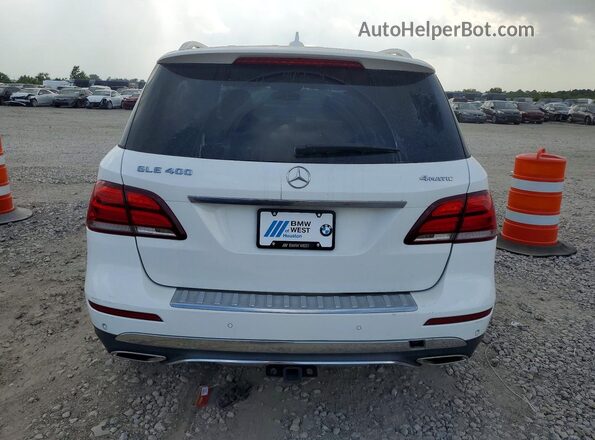 4JGDA5GB5KB218473 2019 MERCEDES-BENZ GLE White Widok wnętrza z przodu