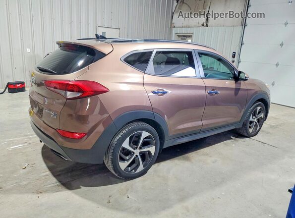 KM8J3CA21GU137542 2016 HYUNDAI TUCSON Коричневый Передняя правая четверть