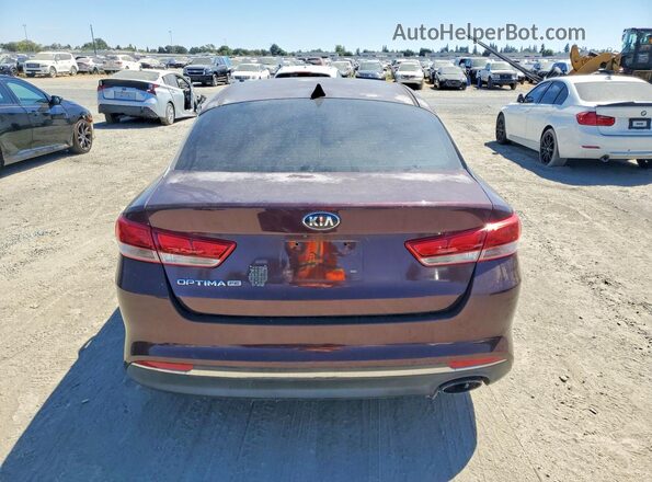 5XXGT4L32GG090277 2016 KIA OPTIMA Бордовый Вид салона спереди
