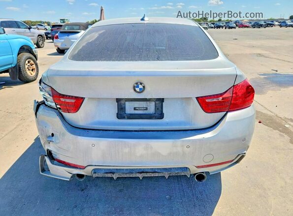 WBA4B1C56GG242217 2016 BMW 4 SERIES Silver Front interior view