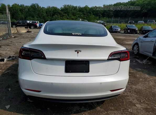 5YJ3E1EA4KF486614 2019 TESLA MODEL 3 White Front interior view