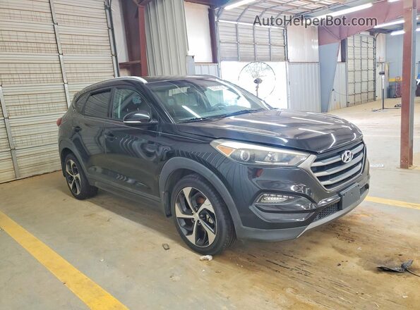 KM8J3CA24GU069334 2016 HYUNDAI TUCSON Black Вид спереду