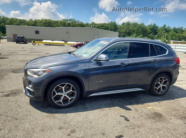 WBXHT3C31GP882429 2016 BMW X1 Gray Rear left