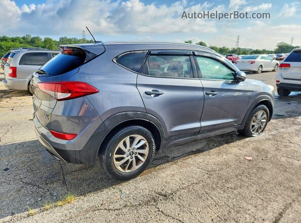 KM8J3CA26GU050249 2016 HYUNDAI TUCSON Gray წინა მარჯვენა