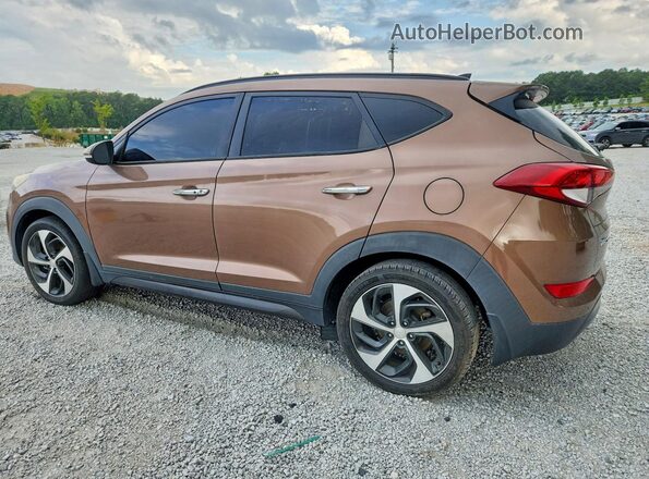 KM8J33A20GU076961 2016 HYUNDAI TUCSON Brown Trasero derecho