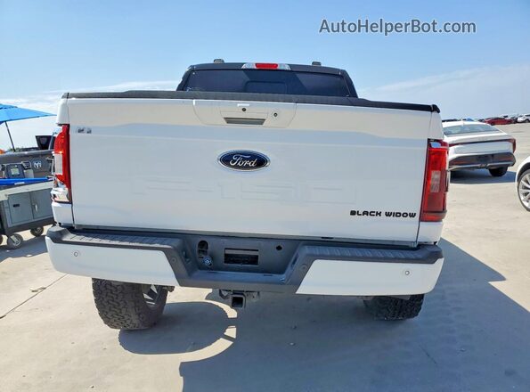 1FTFW1E50PKF33080 2023 FORD F150 White Вид салону спереду