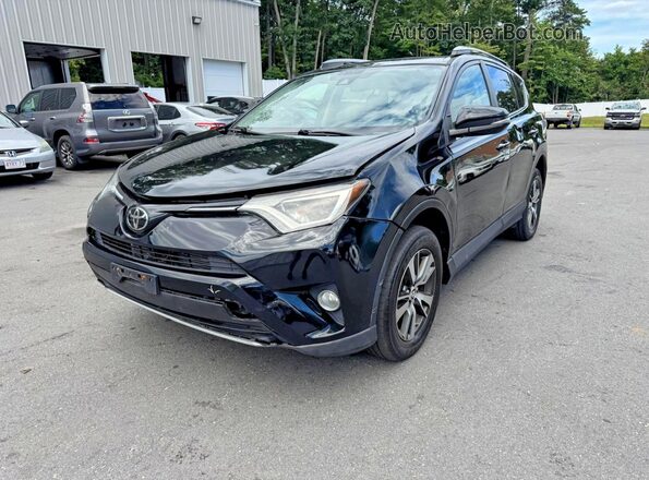 2T3RFREV4JW857885 2018 TOYOTA RAV4 Black Tył lewy