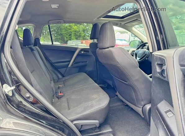 2T3RFREV4JW857885 2018 TOYOTA RAV4 Black Widok wnętrza z tyłu