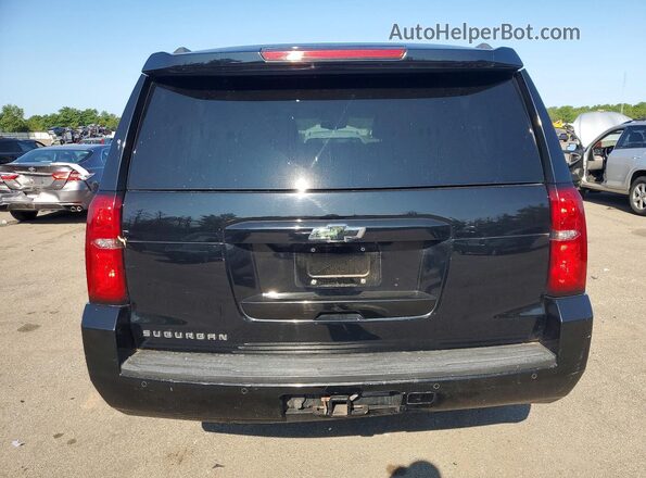 1GNSKHKC0KR313760 2019 CHEVROLET SUBURBAN Black Front interior view