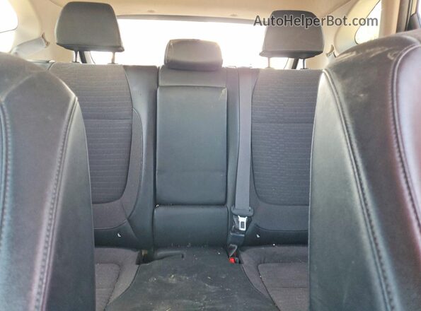 KNDEU2AA0M7098800 2021 KIA SELTOS Black Rear interior view