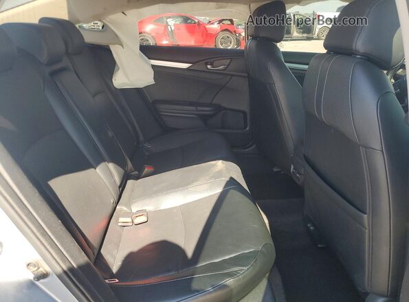 19XFC1F92HE009976 2017 HONDA CIVIC Silver Rear seats view