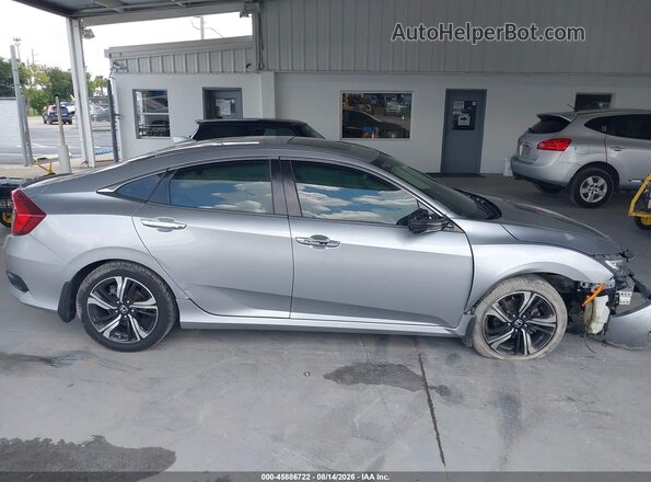 19XFC1F97GE041496 2016 HONDA CIVIC Серебряный Вид задней части салона