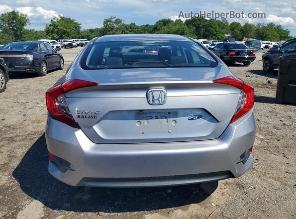19XFC2F50GE239582 2016 HONDA CIVIC Silver Rear view