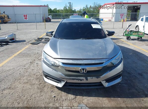 19XFC2F76HE070056 2017 HONDA CIVIC Silver Սալոնի հետևի տեսք