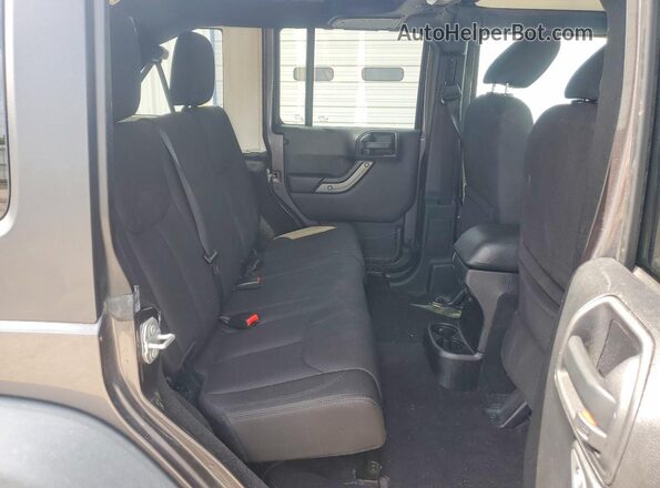 1C4BJWDG1GL209174 2016 JEEP WRANGLER Gray Rear interior view