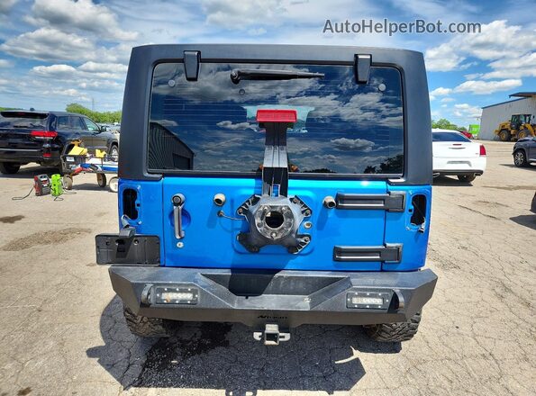 1C4BJWDG1GL270928 2016 JEEP WRANGLER Blue Vista trasera