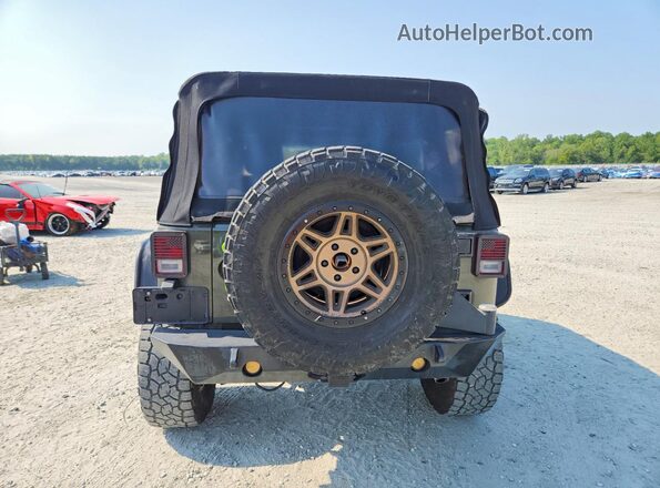 1C4BJWDG3GL105981 2016 JEEP WRANGLER Green Widok z tyłu