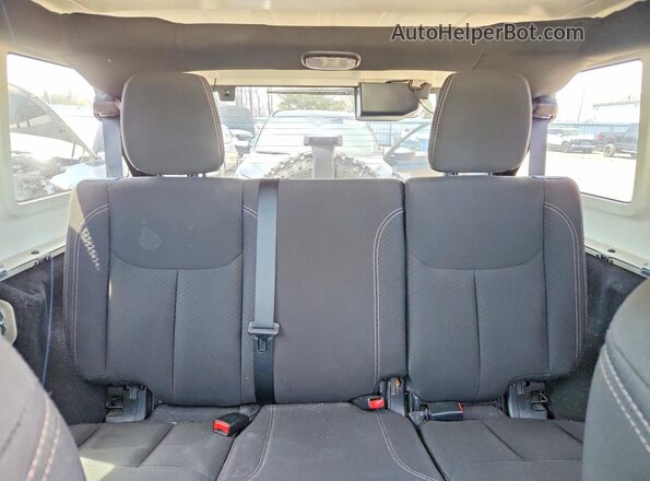 1C4BJWDG3JL864427 2018 JEEP WRANGLER Green Vista de los asientos traseros