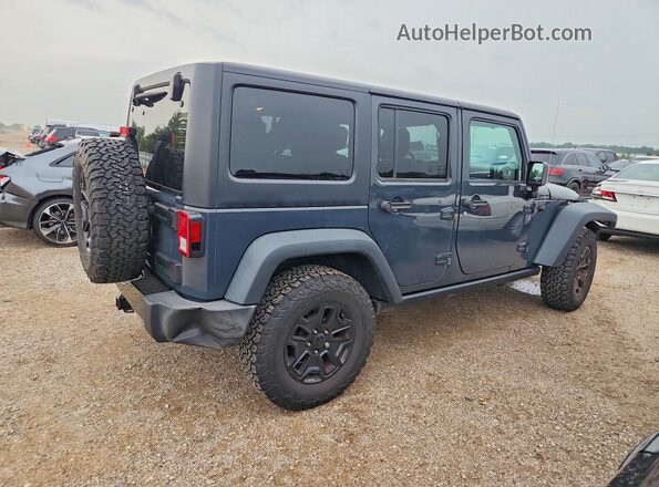 1C4BJWDG4GL216023 2016 JEEP WRANGLER Gray Rear right