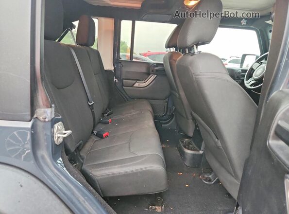 1C4BJWDG4GL216023 2016 JEEP WRANGLER Gray Rear interior view