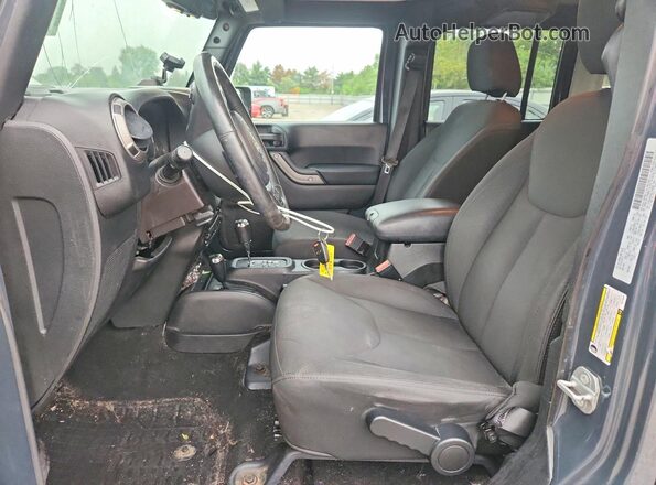 1C4BJWDG4GL216023 2016 JEEP WRANGLER Gray Front interior view