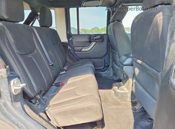 1C4BJWDG4GL285598 2016 JEEP WRANGLER Серый Вид задней части салона