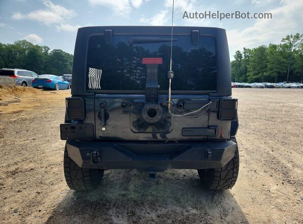 1C4BJWDG6JL858962 2018 JEEP WRANGLER Black Widok z tyłu