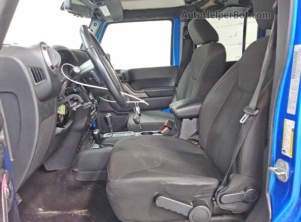 1C4BJWDG9GL179261 2016 JEEP WRANGLER Blue Vista interior delantera