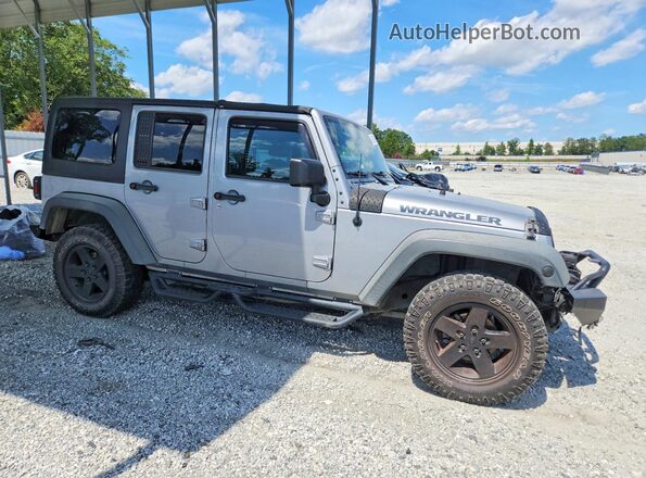 1C4BJWDGXGL130814 2016 JEEP WRANGLER Gray Delantero derecho