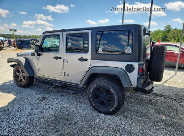 1C4BJWDGXGL130814 2016 JEEP WRANGLER Gray Trasero izquierdo