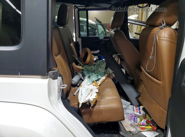 1C4BJWEGXGL340487 2016 JEEP WRANGLER White Vista interior trasera