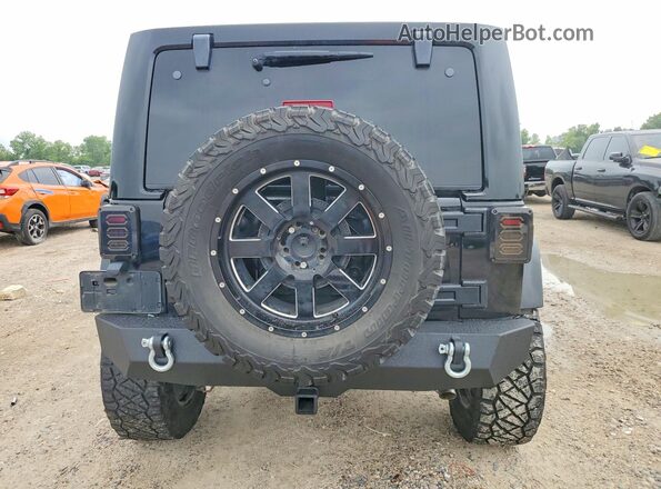 1C4BJWFG5GL179979 2016 JEEP WRANGLER Black Rear view