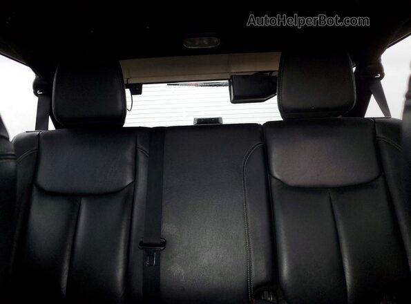 1C4BJWFG5GL179979 2016 JEEP WRANGLER Black Rear seats view