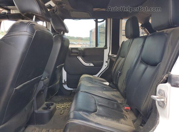 1C4BJWFG8GL163940 2016 JEEP WRANGLER White Widok wnętrza z tyłu
