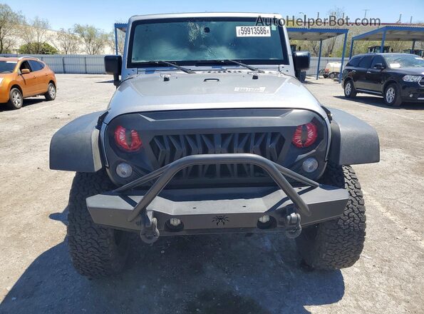 1C4BJWFG8GL263049 2016 JEEP WRANGLER Gray Front view