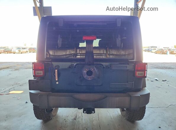 1C4HJWDG5GL235853 2016 JEEP WRANGLER Black Rear view