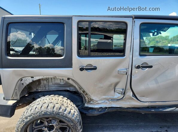 1C4HJWDG6JL868045 2018 JEEP WRANGLER Silver Rear seats view