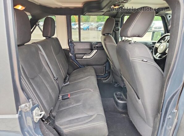 1C4HJWEG2JL897928 2018 JEEP WRANGLER Blue Vista interior trasera