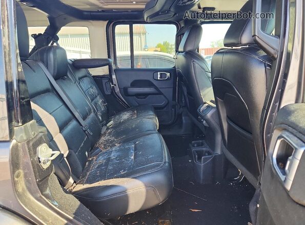 1C4HJXDG2PW595117 2023 JEEP WRANGLER Gray Rear interior view