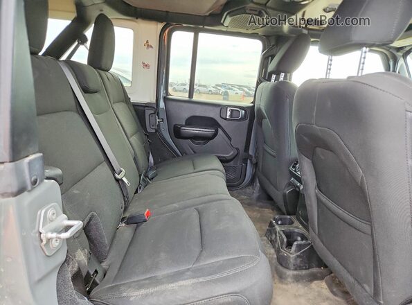 1C4HJXDG7JW216216 2018 JEEP WRANGLER Gray Rear interior view
