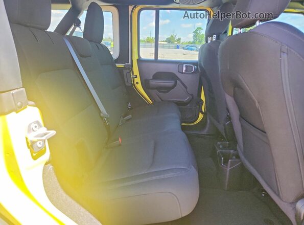 1C4HJXDG9PW585538 2023 JEEP WRANGLER Yellow Vista interior trasera