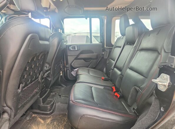 1C4HJXFG8MW712479 2021 JEEP WRANGLER Black Widok wnętrza z tyłu
