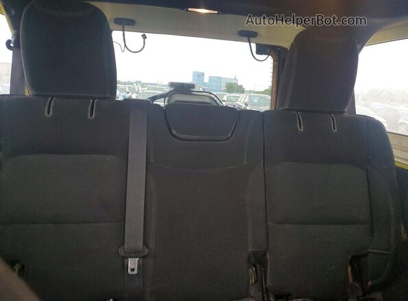 1C4HJXKN3PW611892 2023 JEEP WRANGLER Yellow Widok tylnych siedzeń