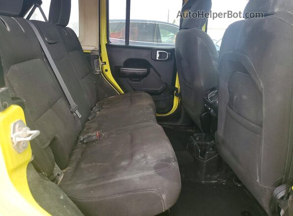 1C4HJXKN3PW611892 2023 JEEP WRANGLER Yellow Widok wnętrza z tyłu