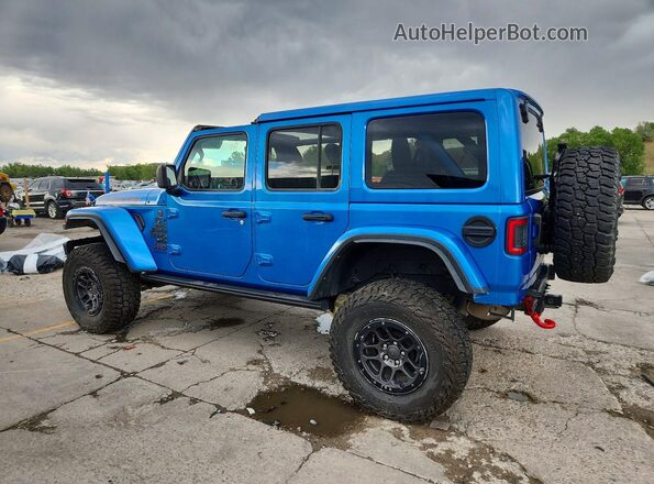 1C4JJXFGXPW630002 2023 JEEP WRANGLER Blue Tył lewy