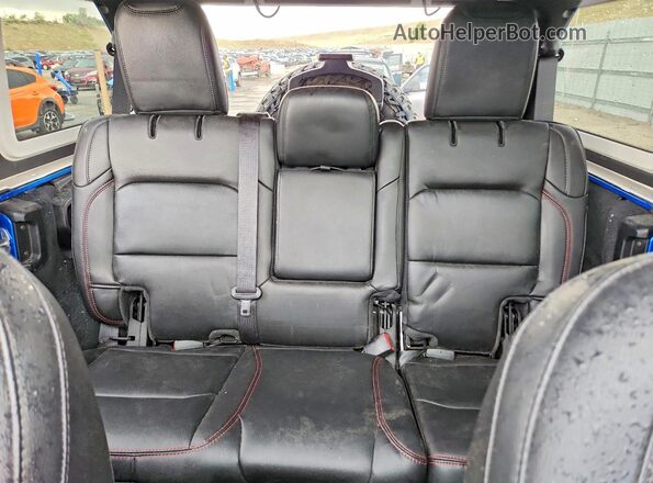 1C4JJXFGXPW630002 2023 JEEP WRANGLER Blue Widok tylnych siedzeń