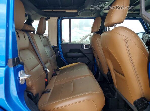 1C4JJXP6XPW513199 2023 JEEP WRANGLER Blue Rear interior view