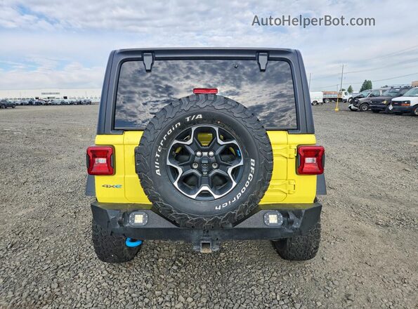 1C4JJXR69PW516043 2023 JEEP WRANGLER Yellow Հետևի տեսք
