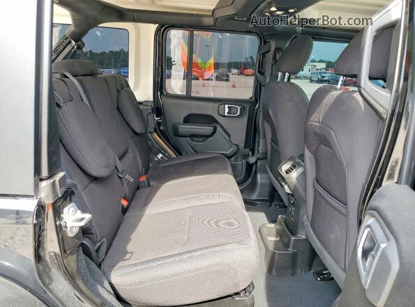 1C4JJXR6XPW606009 2023 JEEP WRANGLER Черный Вид задней части салона