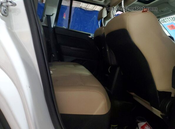 1C4NJCBB1GD703127 2016 JEEP COMPASS White Սալոնի հետևի տեսք